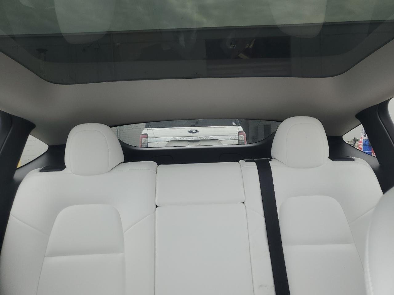 2023 Tesla Model Y VIN: 7SAYGAEE4PF693730 Lot: 81366555