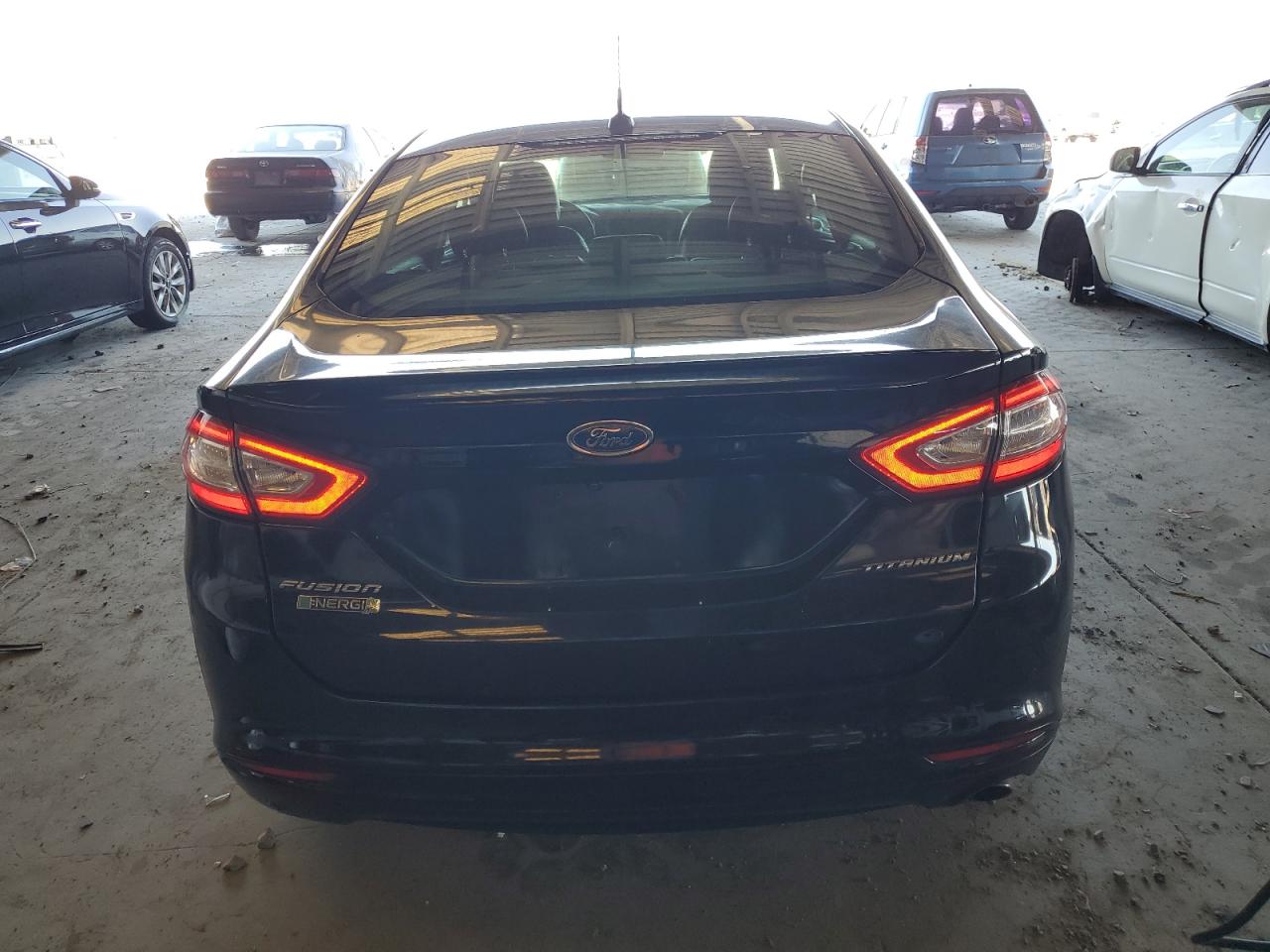 2016 Ford Fusion Titanium Phev VIN: 3FA6P0SU8GR329518 Lot: 81732655