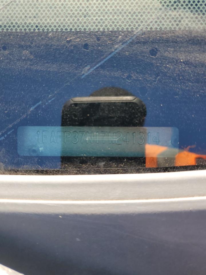 2007 Ford Focus Zx5 VIN: 1FAFP37N17W241314 Lot: 80346525