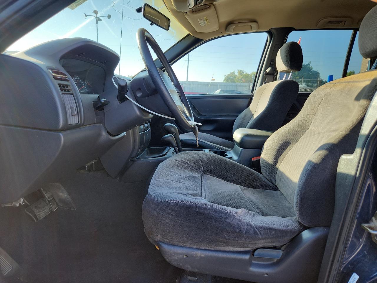 2000 Jeep Grand Cherokee Laredo VIN: 1J4GW48S0YC260736 Lot: 81474135