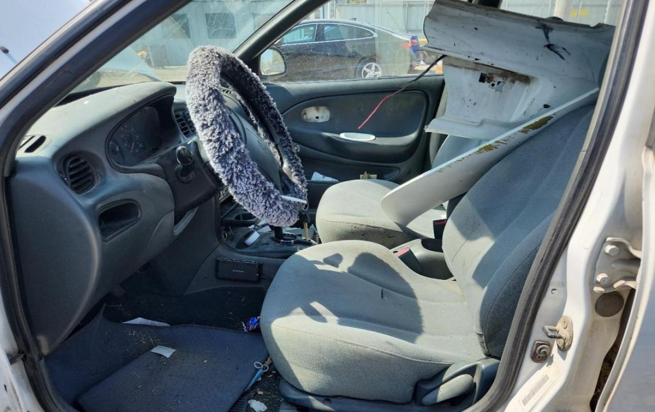 1998 Hyundai Elantra VIN: KMHJF24M9WU661258 Lot: 80200505