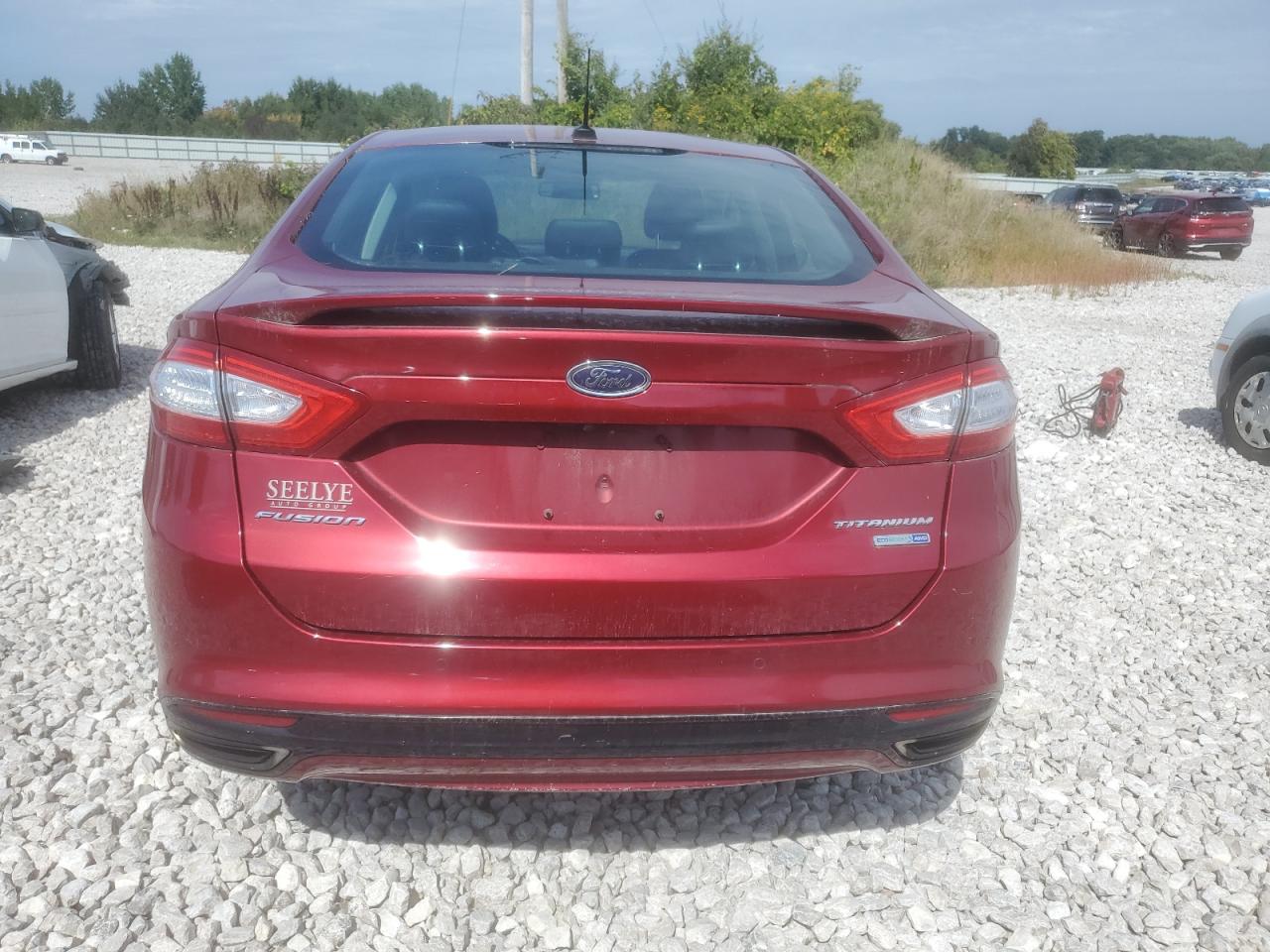 2016 Ford Fusion Titanium VIN: 3FA6P0D9XGR255818 Lot: 70651535