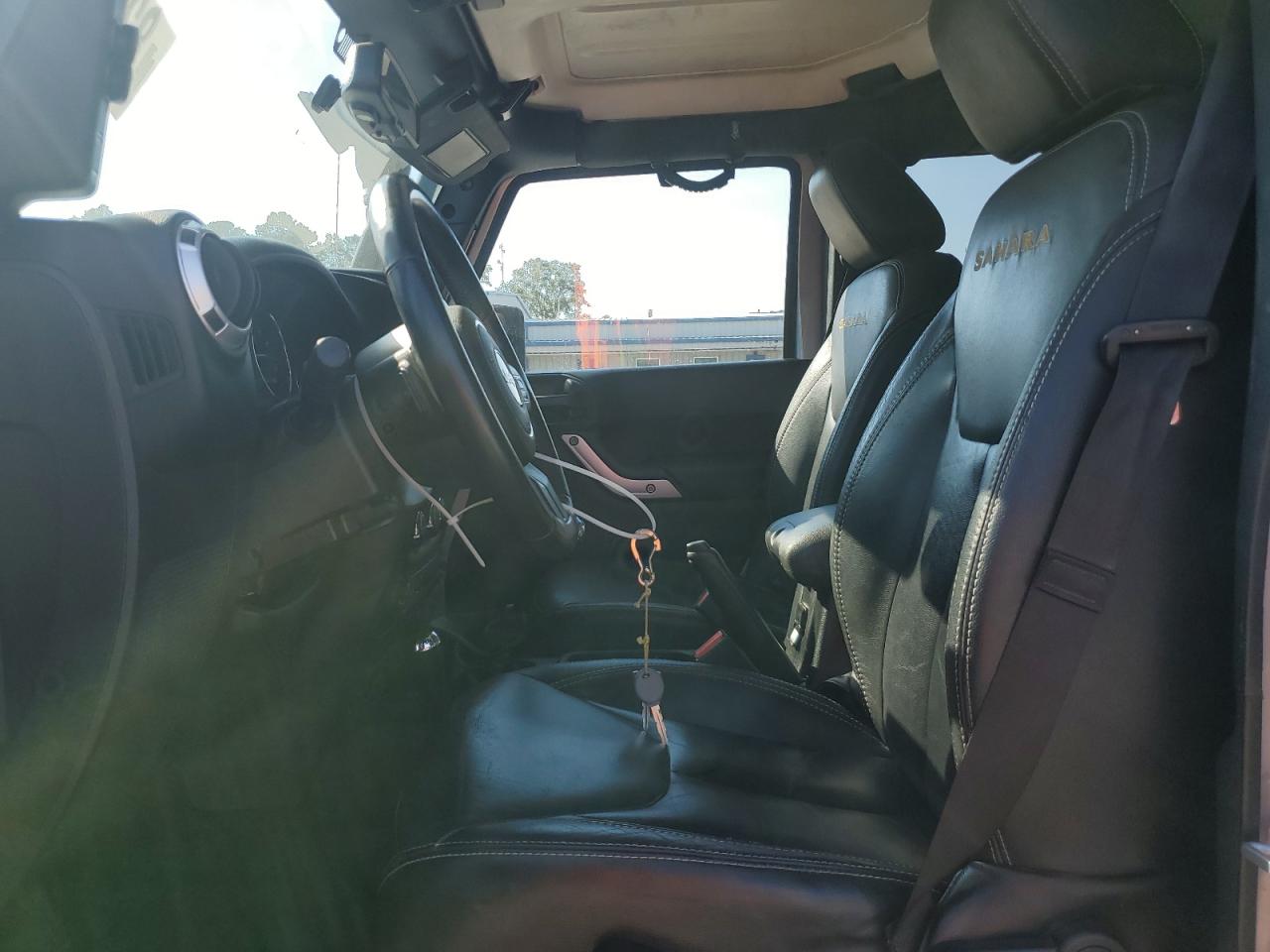 2014 Jeep Wrangler Unlimited Sahara VIN: 1C4BJWEG9EL198579 Lot: 82073175