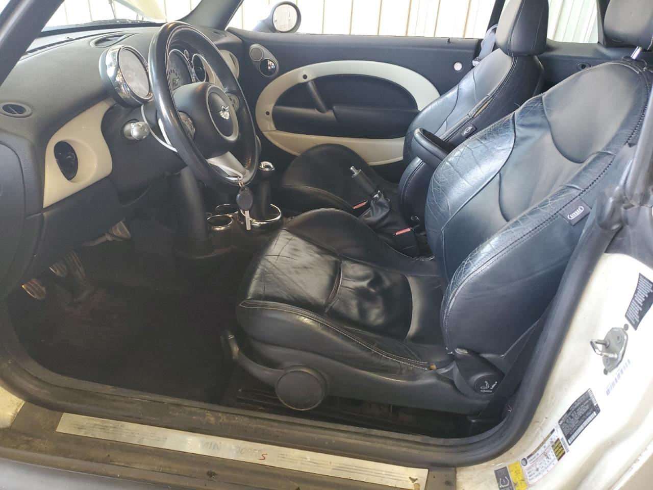 2007 Mini Cooper S VIN: WMWRH33557TL95677 Lot: 70437875