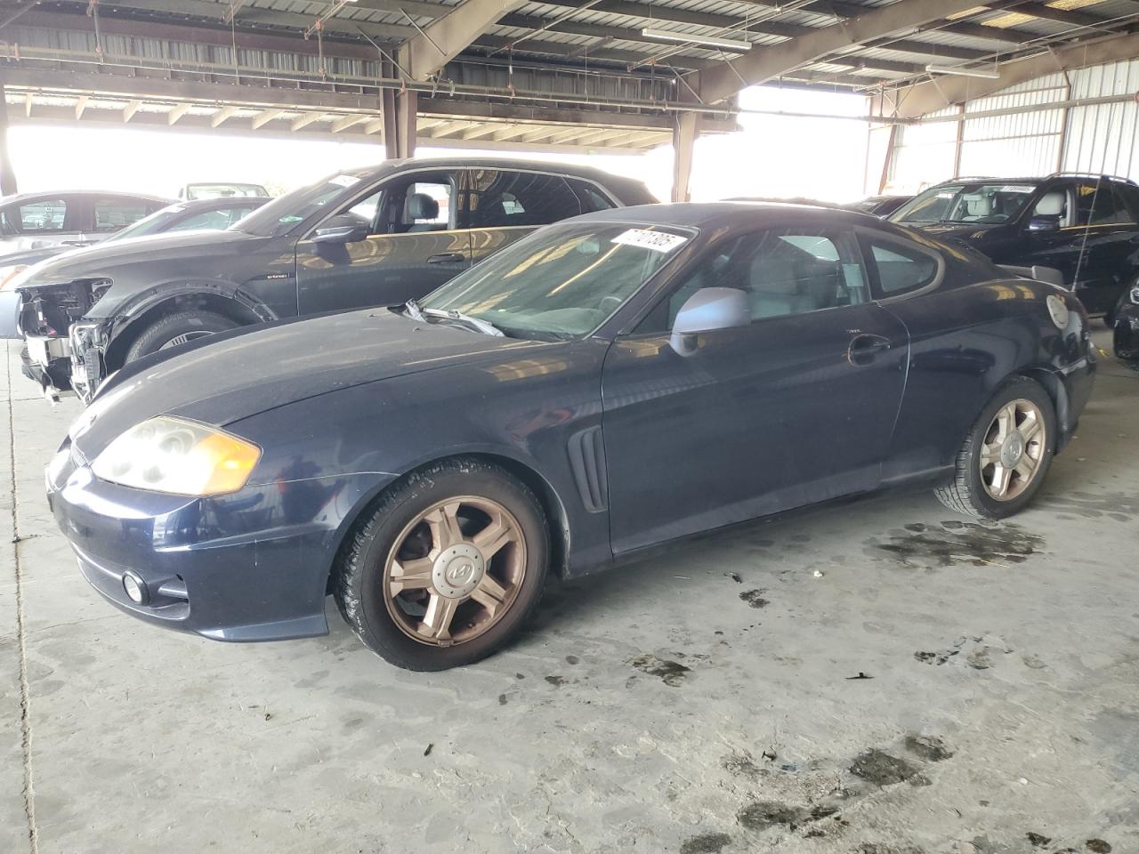 HYUNDAI TIBURON 2004. Lot# 72101305. VIN KMHHM65D04U107131. Photo 1