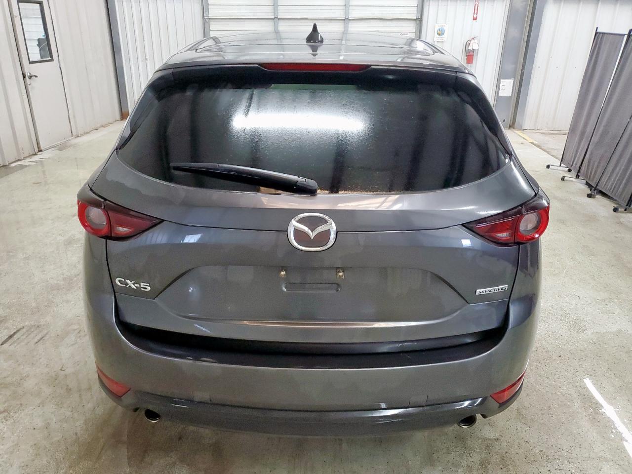 2021 Mazda Cx-5 Touring VIN: JM3KFACM3M1382074 Lot: 81589925
