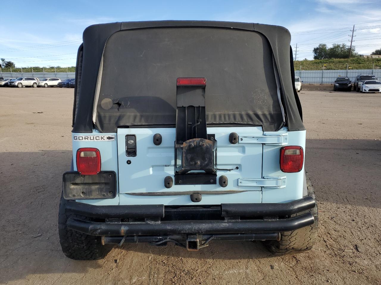 2000 Jeep Wrangler / Tj Sport VIN: 1J4FA49S9YP761383 Lot: 82173305