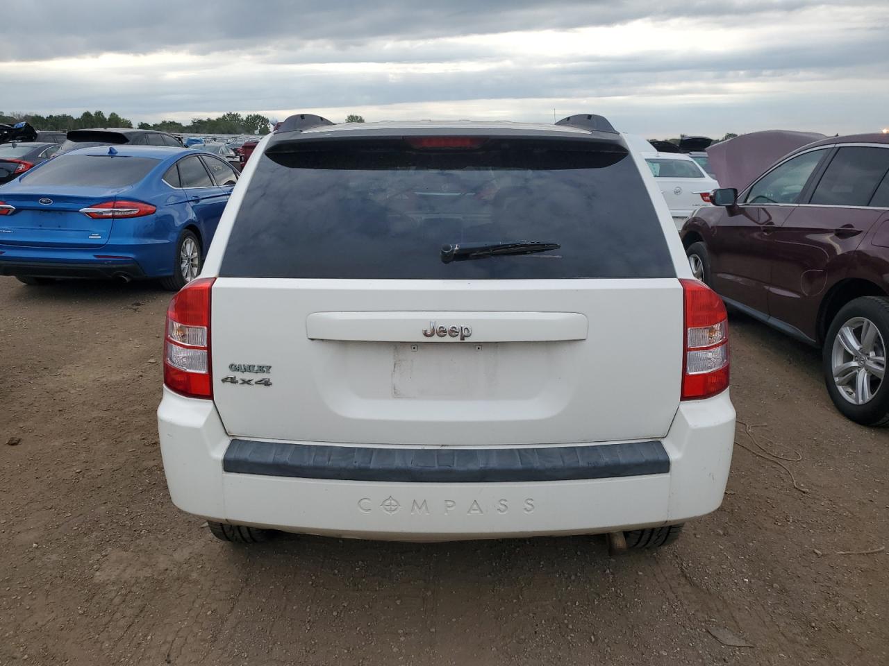 2007 Jeep Compass VIN: 1J8FF47W67D264992 Lot: 70579255