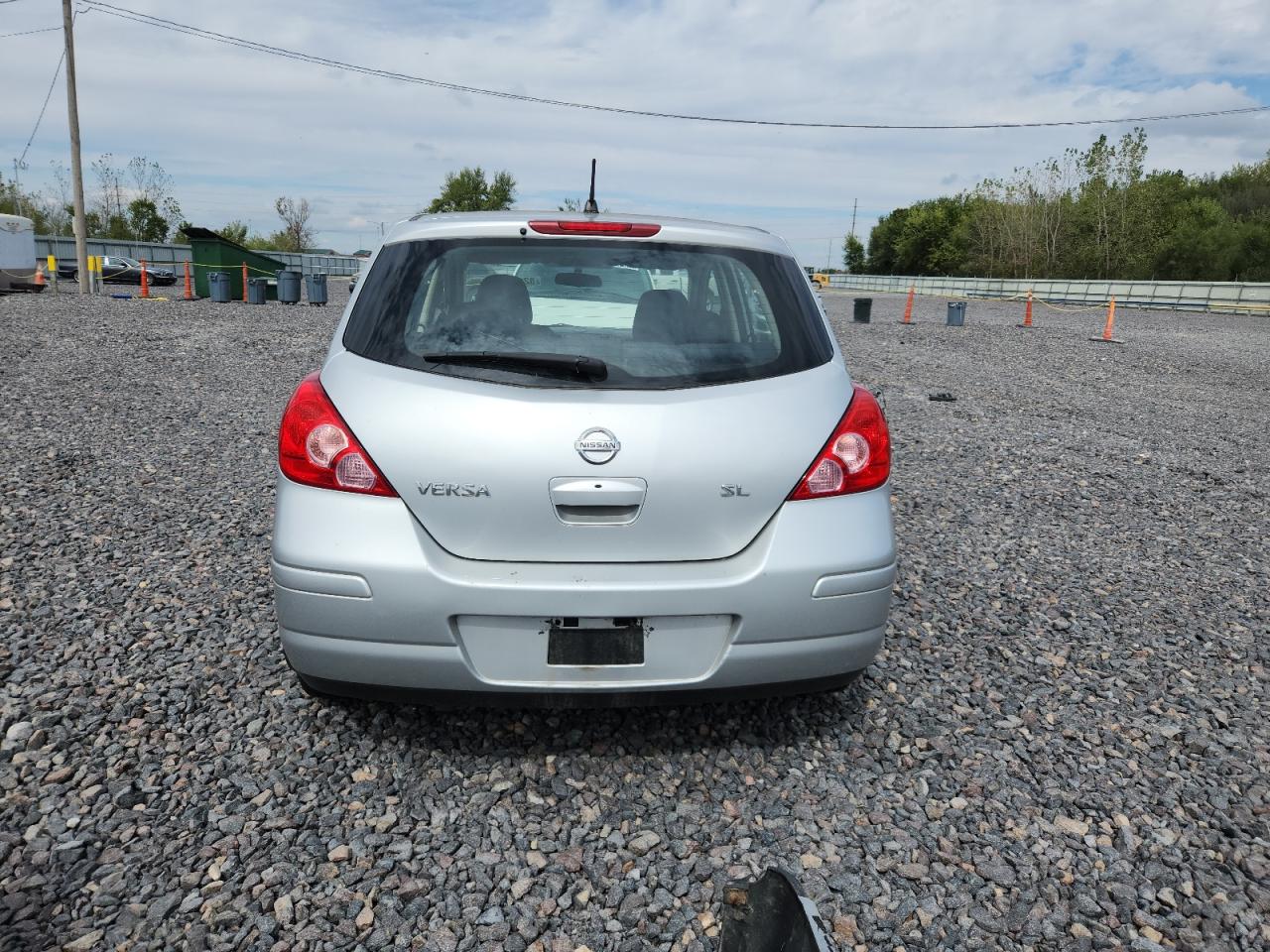 2009 Nissan Versa S VIN: 3N1BC13E49L410283 Lot: 82145935