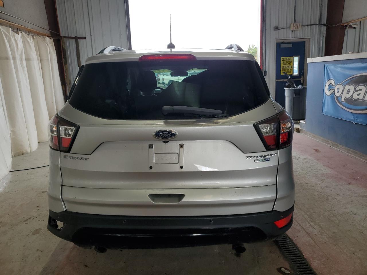 2017 Ford Escape Titanium VIN: 1FMCU9J92HUA77942 Lot: 81024075