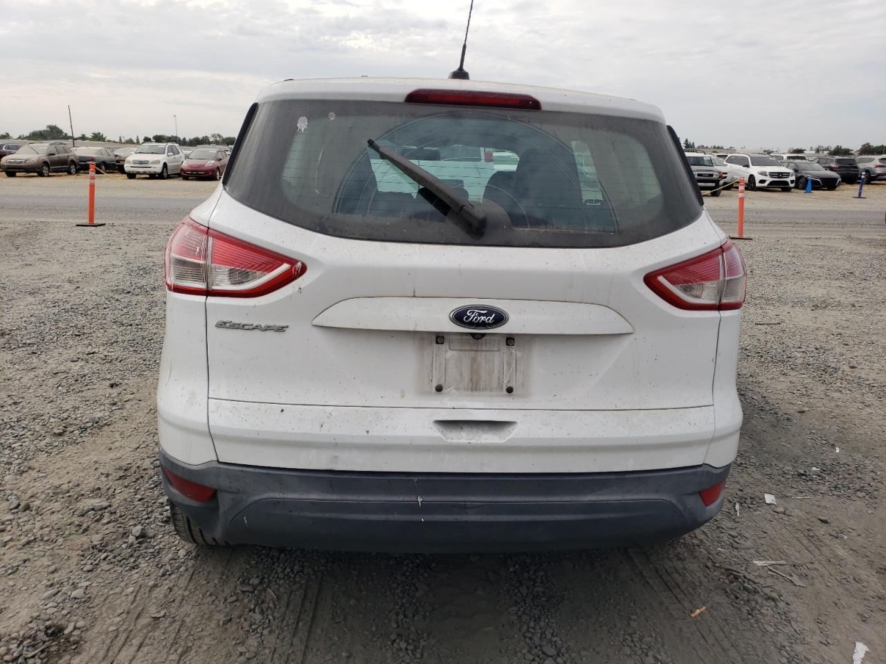 2014 Ford Escape S VIN: 1FMCU0F7XEUE14677 Lot: 81085935