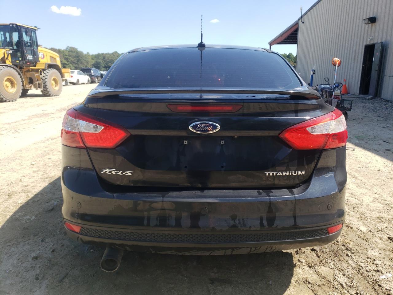 2014 Ford Focus Titanium VIN: 1FADP3J25EL201791 Lot: 71055575