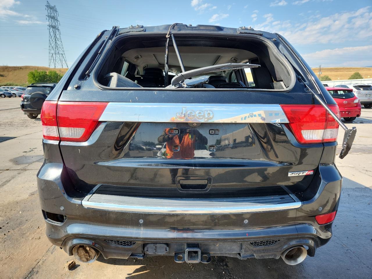 2012 Jeep Grand Cherokee Srt-8 VIN: 1C4RJFDJ6CC351718 Lot: 70483635