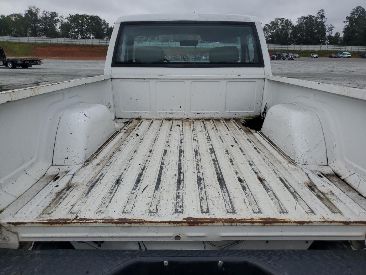 1991 Jeep Comanche VIN: 1J7FT26S9ML581330 Lot: 83868325