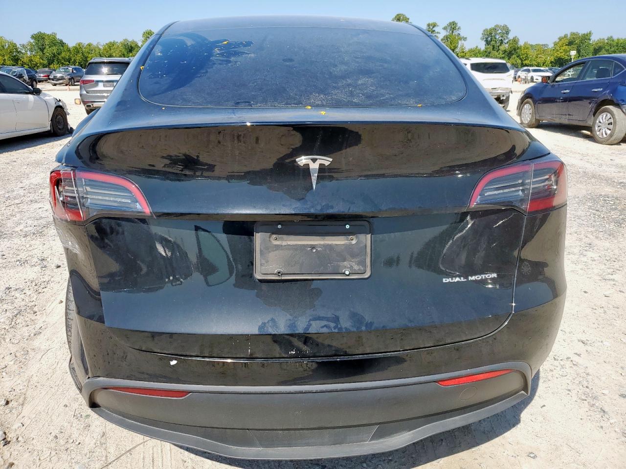 2023 Tesla Model Y VIN: 7SAYGDEE0PF631534 Lot: 71042685