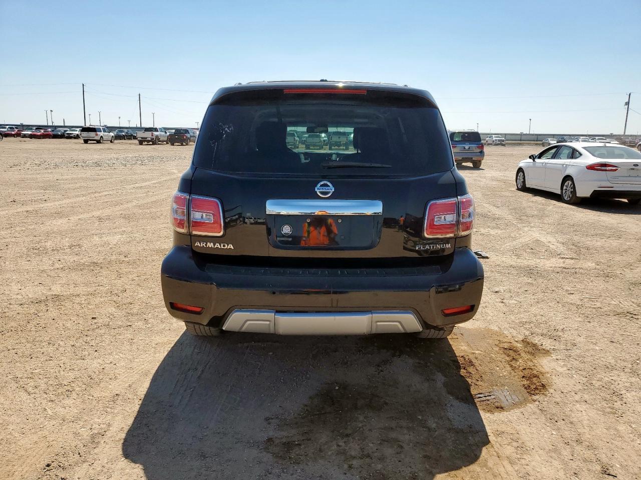 2017 Nissan Armada Platinum VIN: JN8AY2NFXH9303997 Lot: 80652995