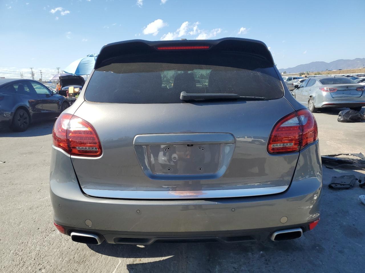 2012 Porsche Cayenne S Hybrid VIN: WP1AE2A29CLA90588 Lot: 84244395