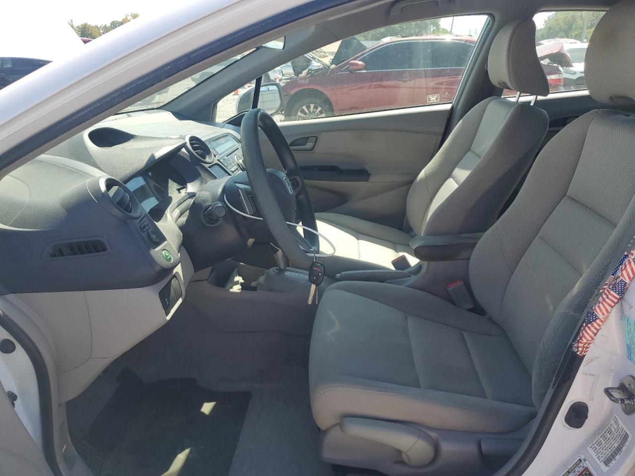 2010 Honda Insight Ex VIN: JHMZE2H74AS007401 Lot: 69814285