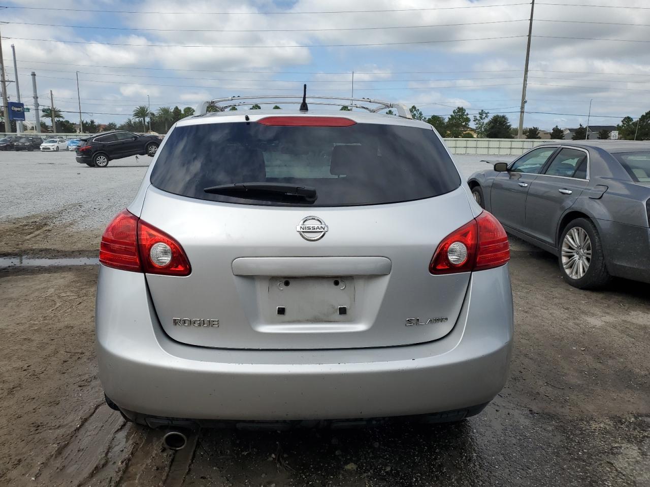 2010 Nissan Rogue S VIN: JN8AS5MV9AW124448 Lot: 84428375