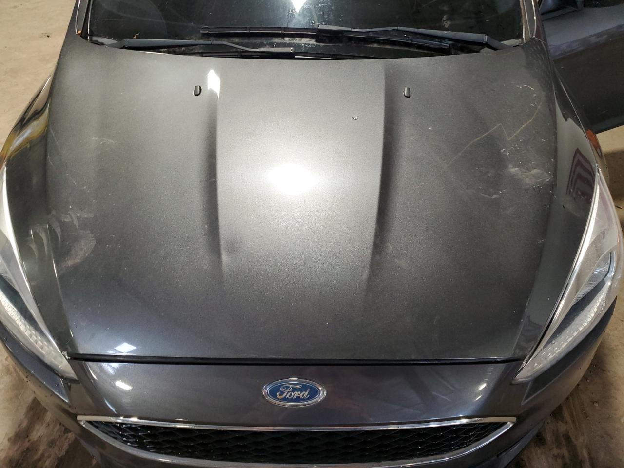 2018 Ford Focus Se VIN: 1FADP3F23JL267551 Lot: 71073505