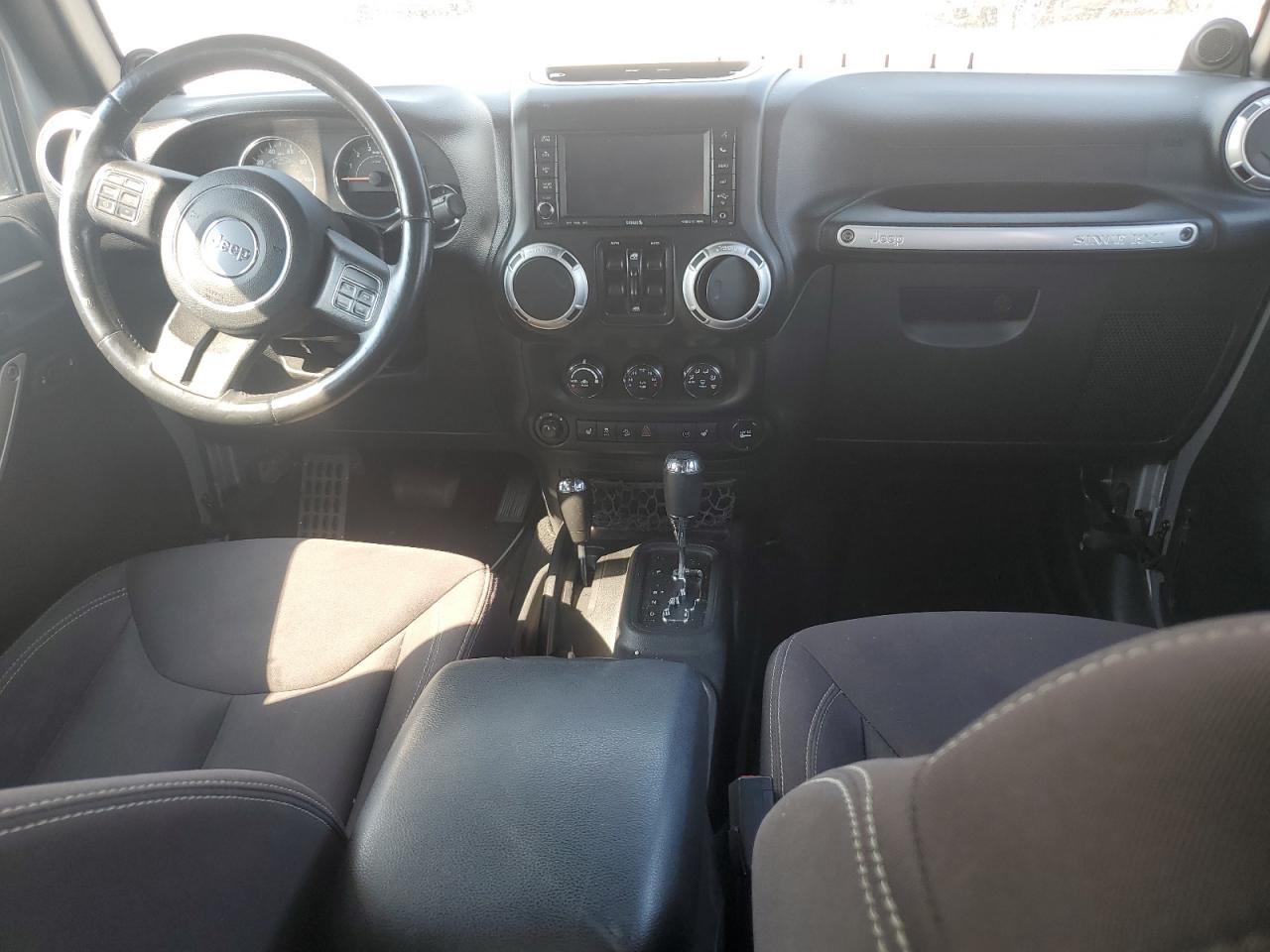 2014 Jeep Wrangler Unlimited Sahara VIN: 1C4BJWEG2EL183003 Lot: 81305845