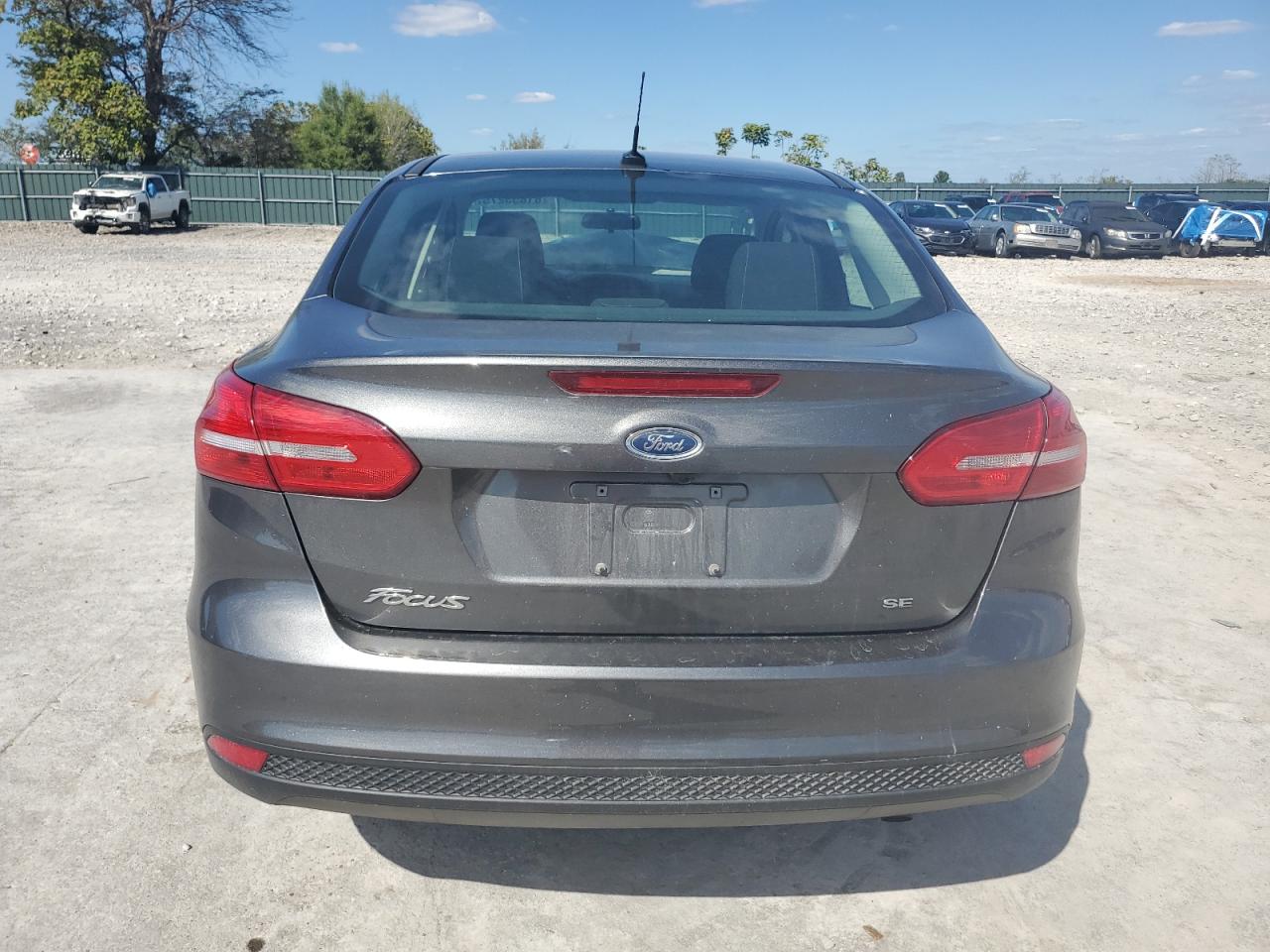2017 Ford Focus Se VIN: 1FADP3F26HL203143 Lot: 81853275