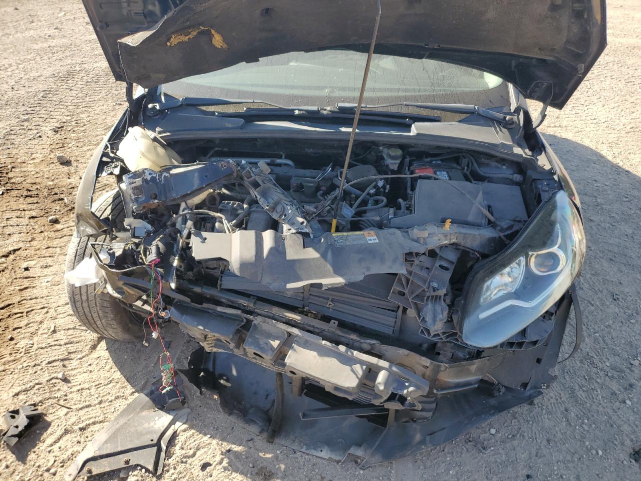 2014 Ford Focus Titanium VIN: 1FADP3J20EL253412 Lot: 83834645