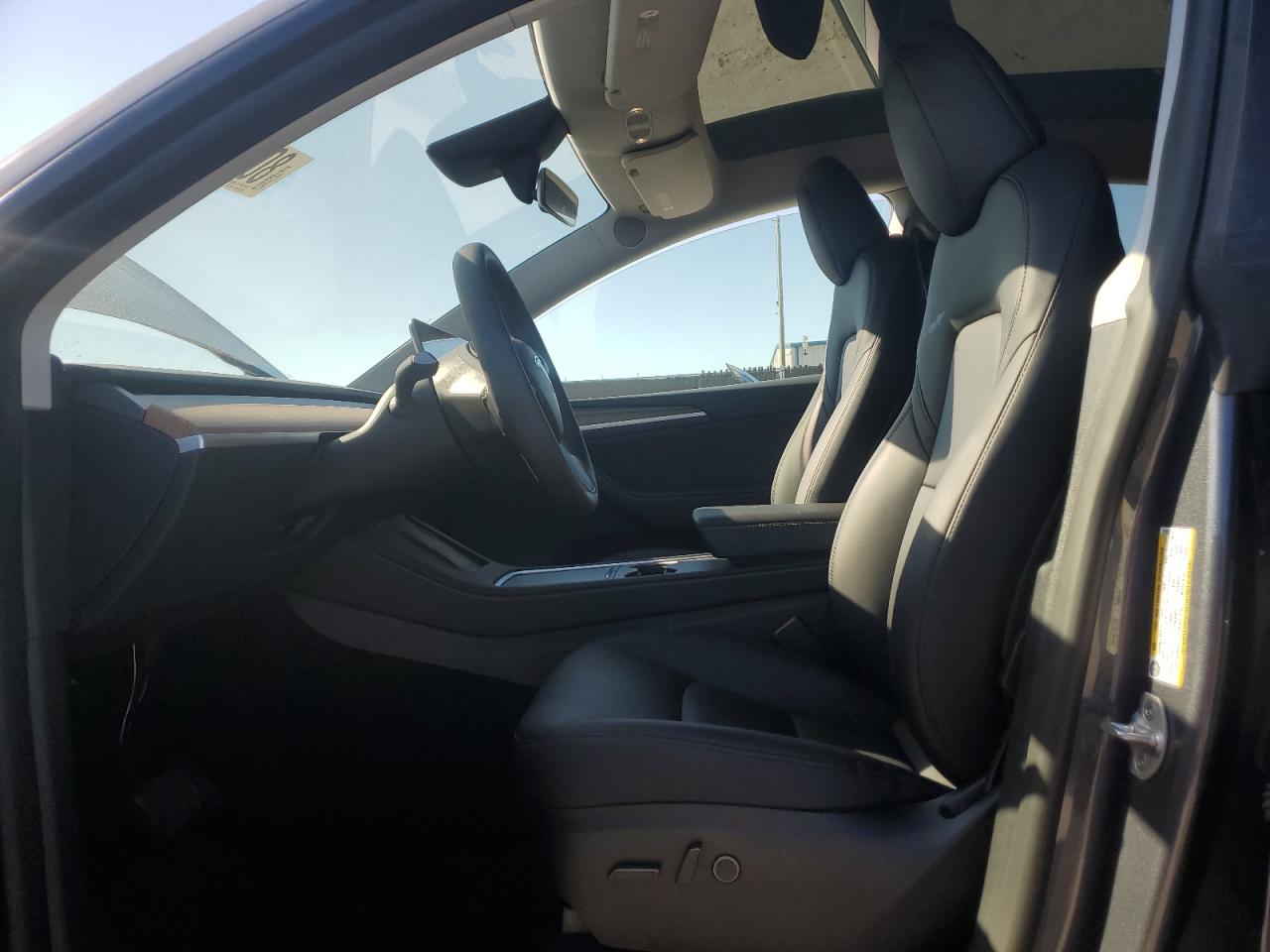 2023 Tesla Model Y VIN: 7SAYGDEE1PA211018 Lot: 80512575