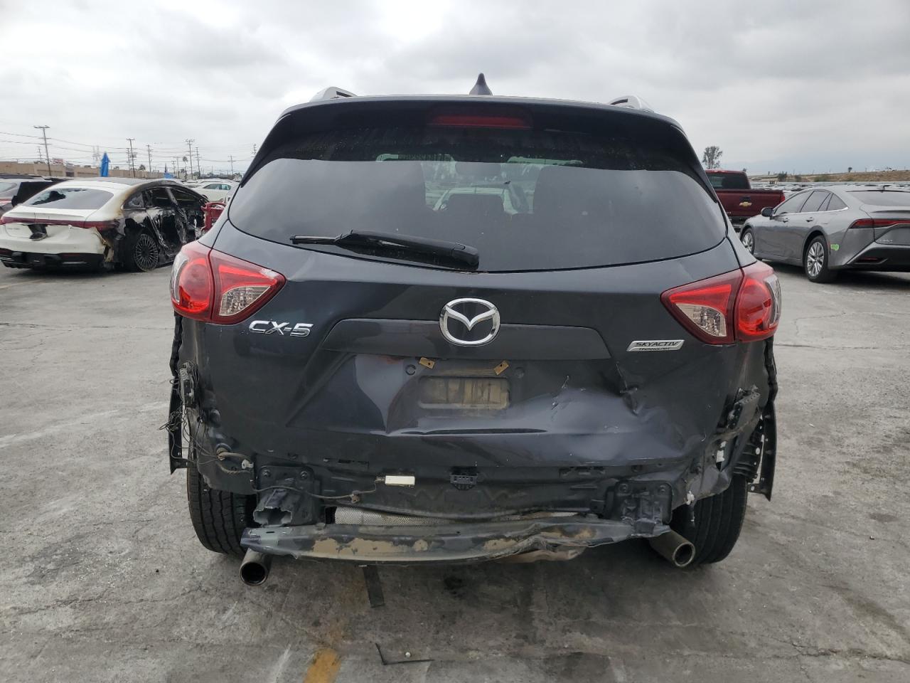 2015 Mazda Cx-5 Touring VIN: JM3KE2CYXF0532220 Lot: 81842235