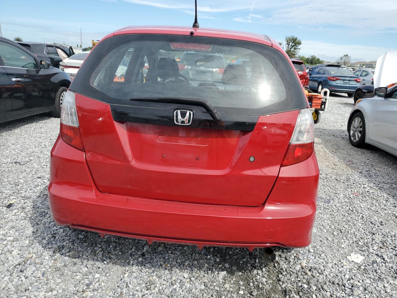 2009 Honda Fit VIN: JHMGE88259S023519 Lot: 82027475