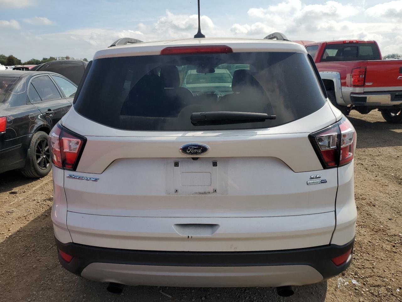 2018 Ford Escape Se VIN: 1FMCU9GDXJUA50067 Lot: 82125525