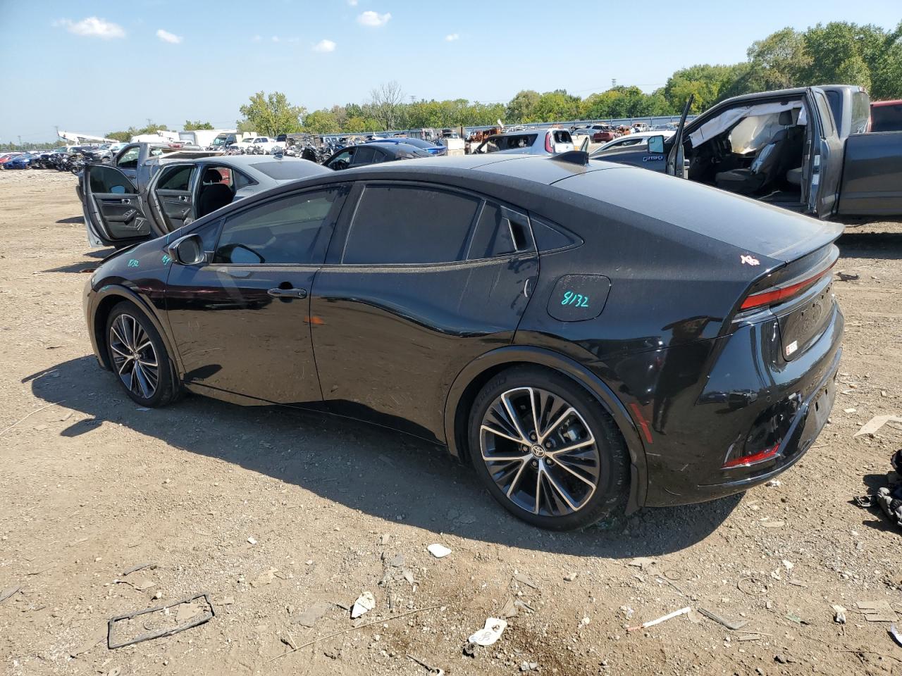 2024 Toyota Prius Le black null hybrid JTDADABUXR3012117 photo #3