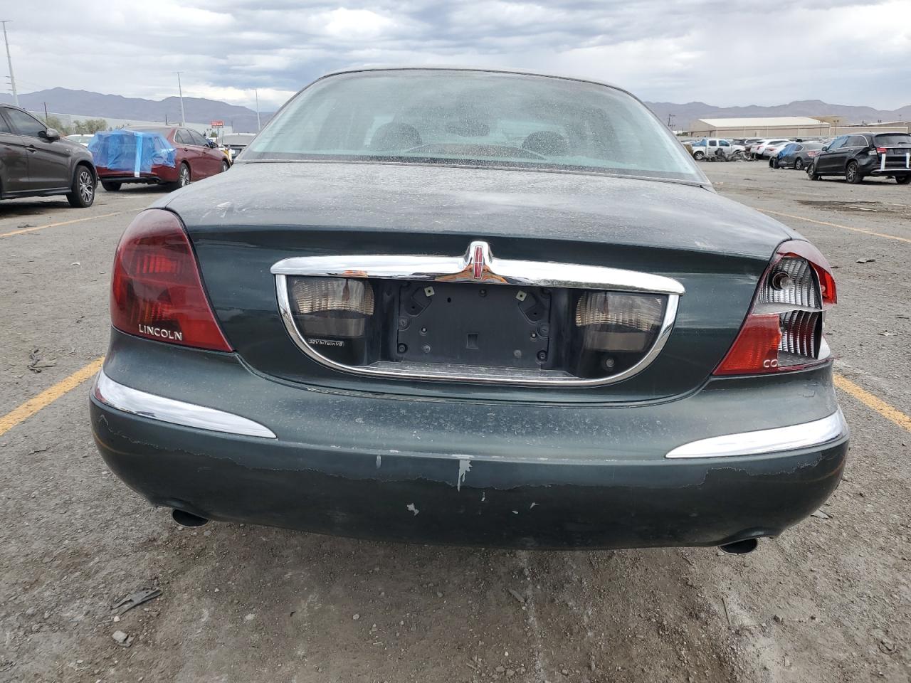 2002 Lincoln Continental VIN: 1LNHM97V32Y680621 Lot: 71515575