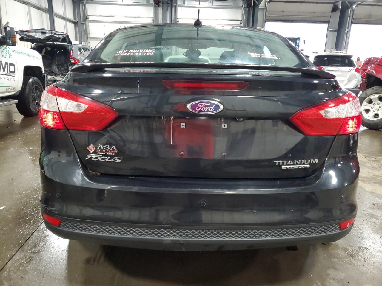 2014 Ford Focus Titanium VIN: 1FADP3J28EL169256 Lot: 69953265
