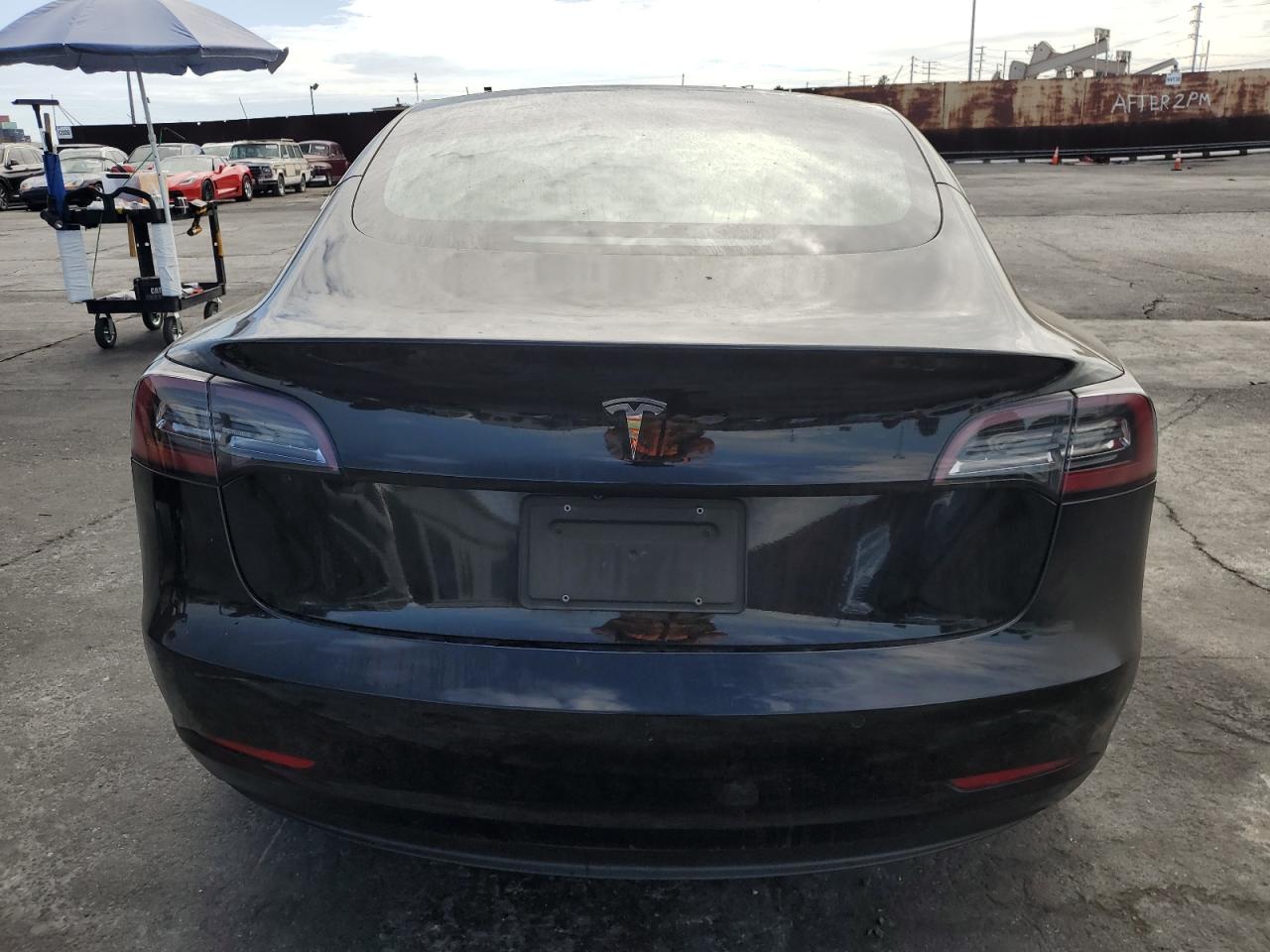 2020 Tesla Model 3 VIN: 5YJ3E1EA0LF704565 Lot: 81520135
