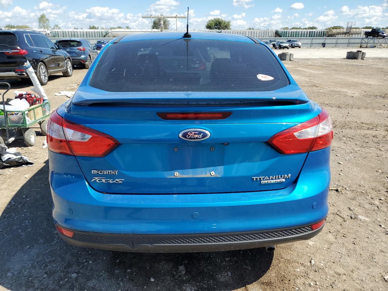 2012 Ford Focus Titanium VIN: 1FAHP3J21CL409908 Lot: 80290285