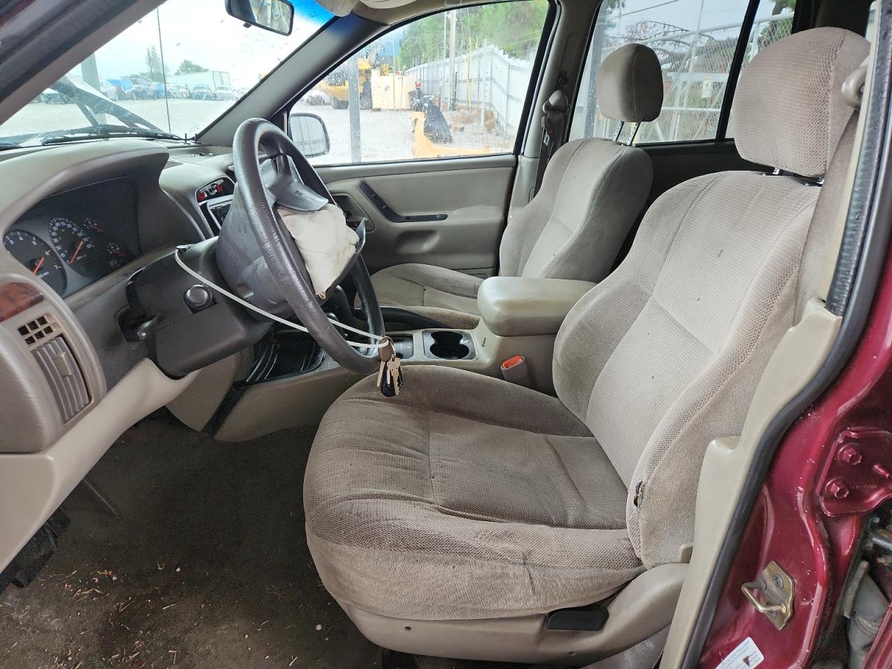 2000 Jeep Grand Cherokee Laredo VIN: 1J4GW48S1YC389472 Lot: 81714815