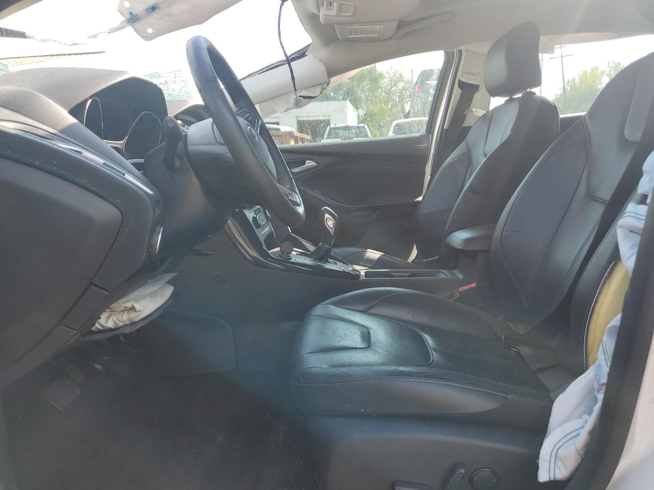 2016 Ford Focus Titanium VIN: 1FADP3N29GL303527 Lot: 81899375