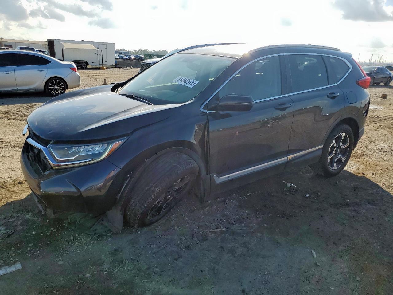 2017 Honda Cr-V Touring black null gasoline 2HKRW2H99HH646639 photo #1