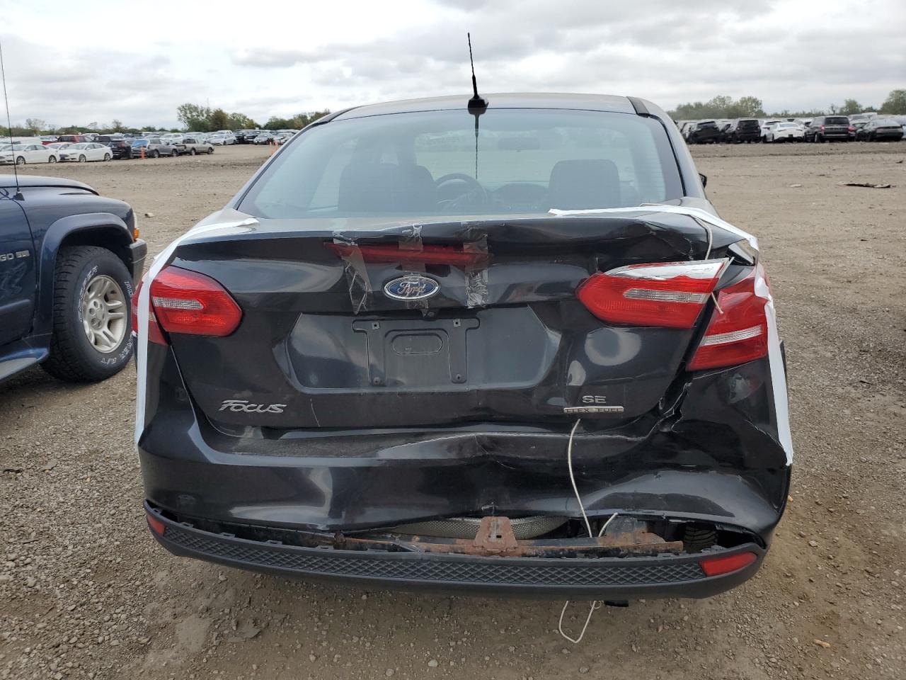 2015 Ford Focus Se VIN: 1FADP3F23FL378785 Lot: 81695275