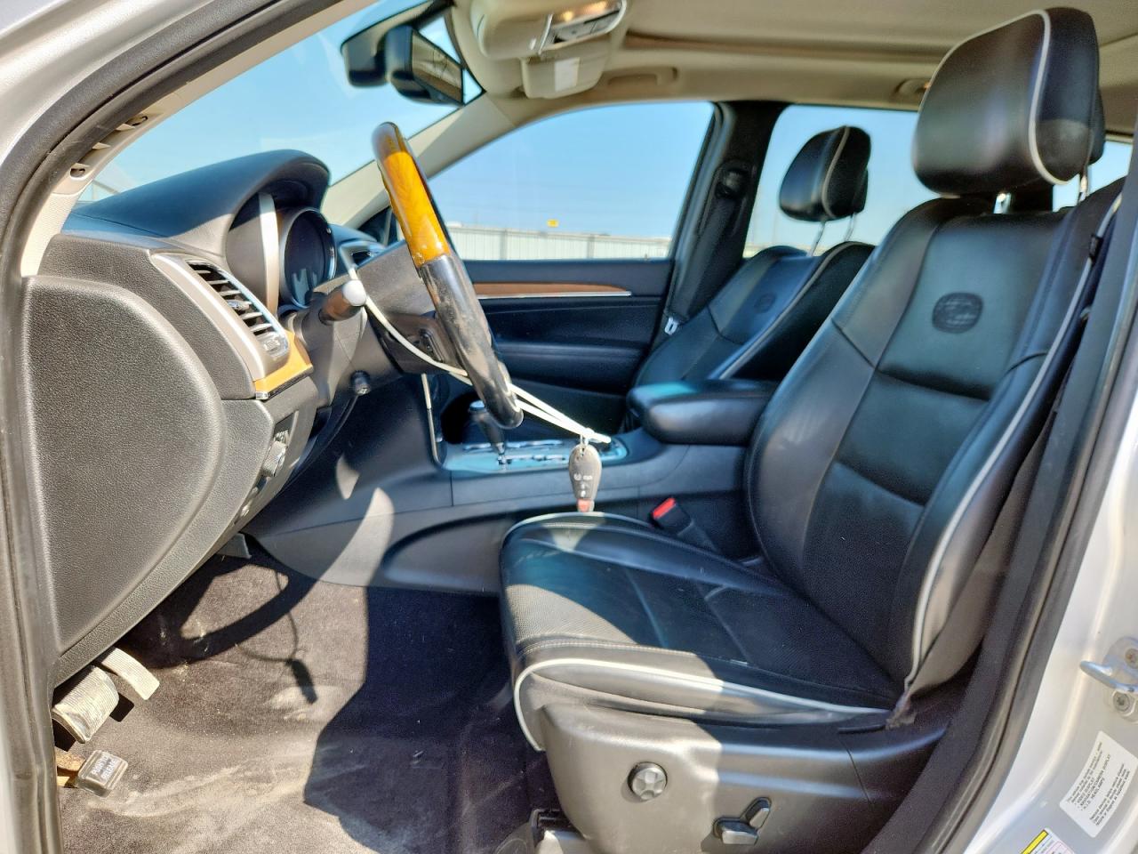 2011 Jeep Grand Cherokee Overland VIN: 1J4RR6GG8BC560301 Lot: 82116375