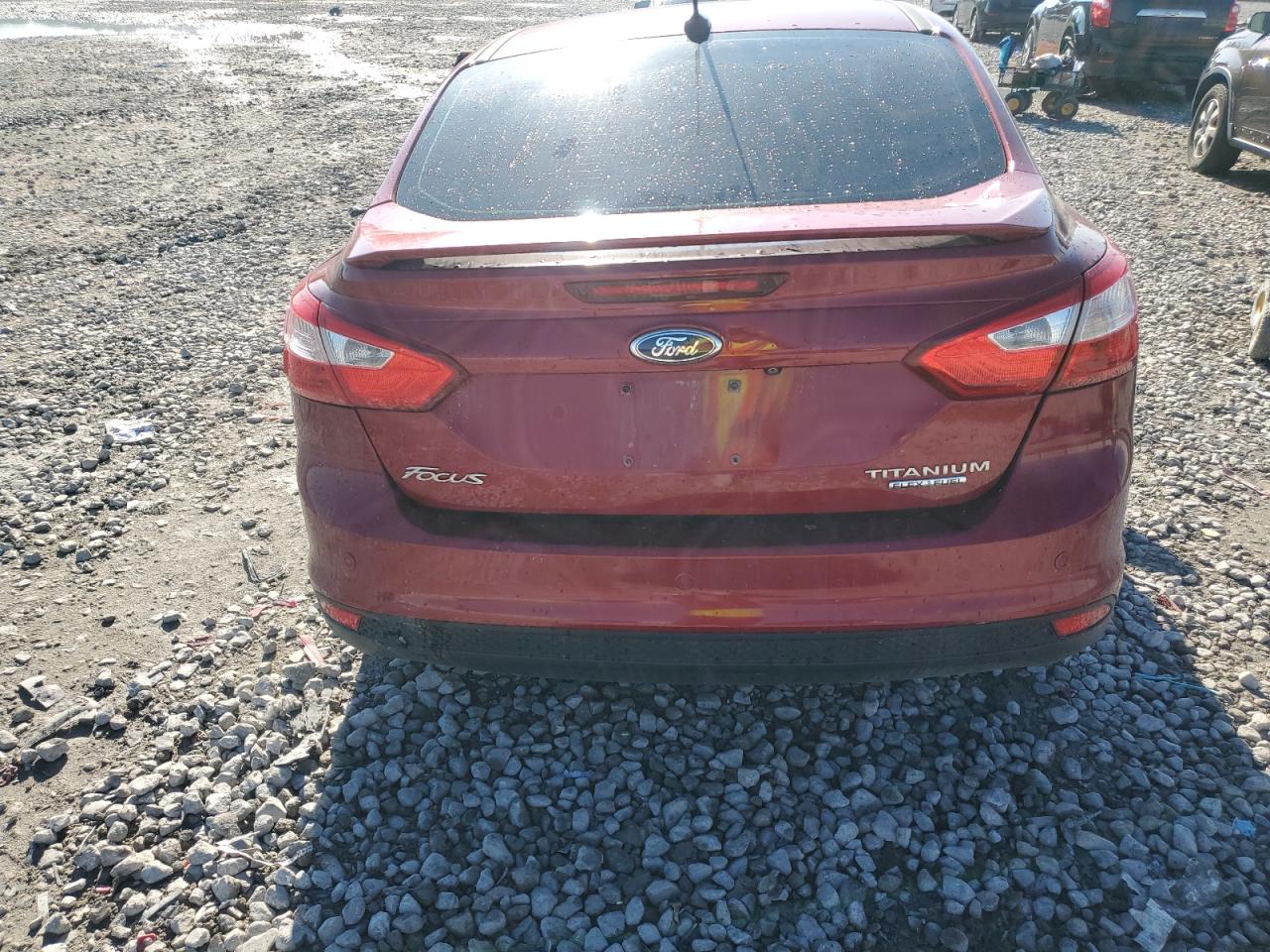 2014 Ford Focus Titanium VIN: 1FADP3J21EL349310 Lot: 81762555