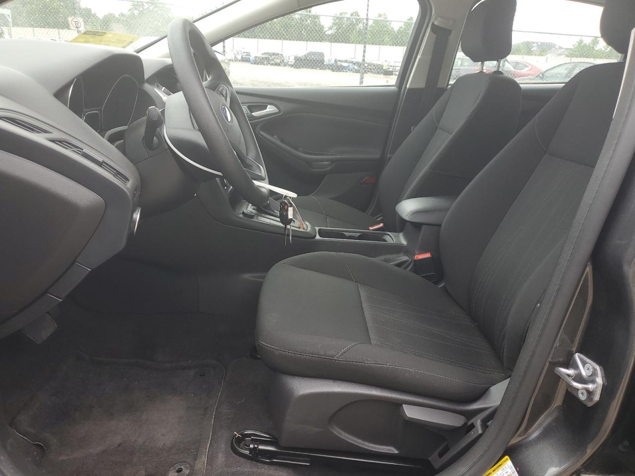 2018 Ford Focus Se VIN: 1FADP3FE8JL256717 Lot: 81587645