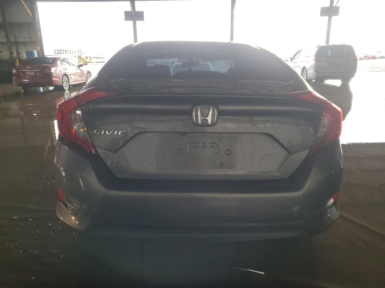 2018 Honda Civic Lx VIN: 19XFC2F58JE041856 Lot: 81880065