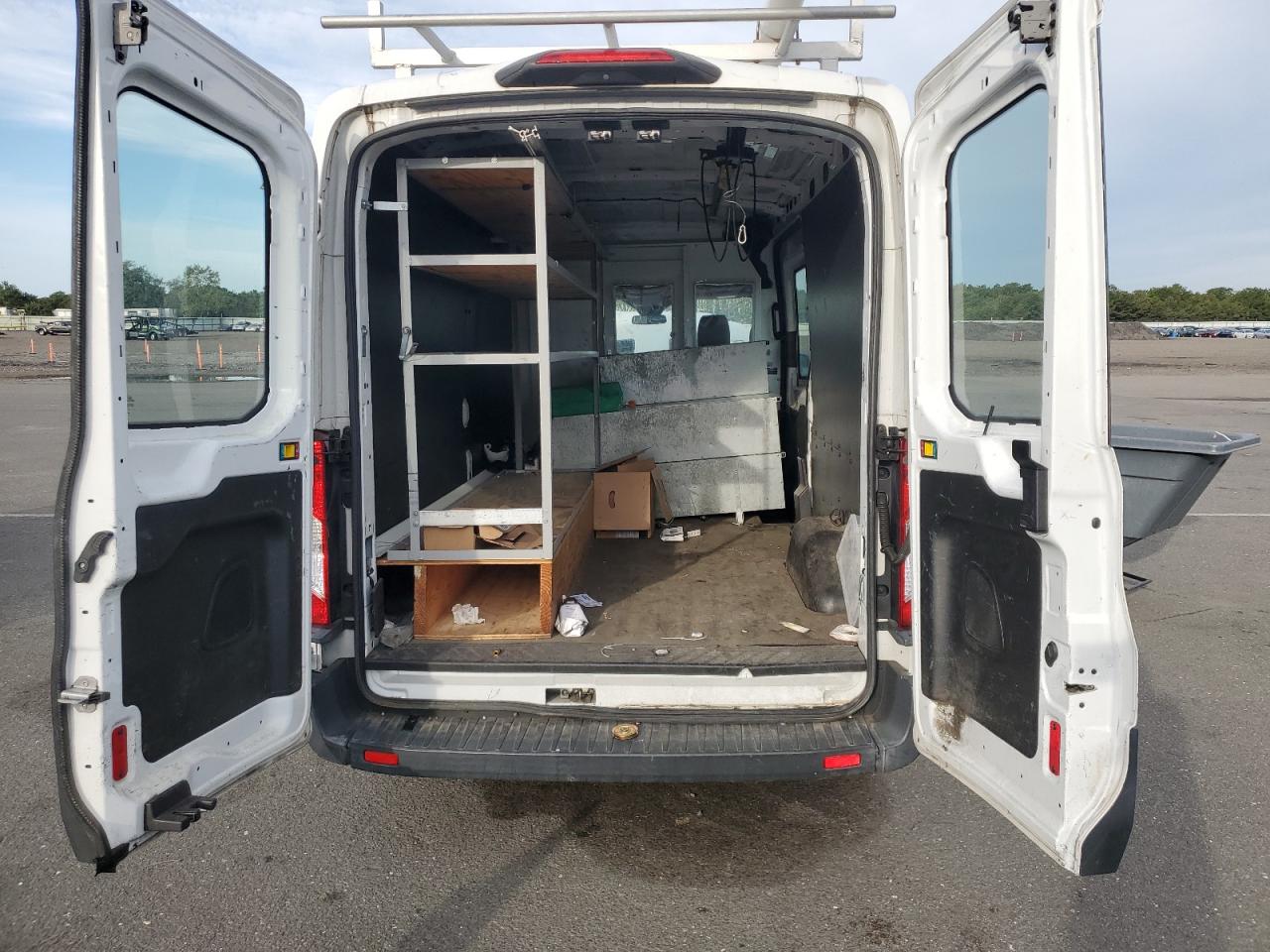 2018 Ford Transit T-150 VIN: 1FTYE2CM6JKA40815 Lot: 84353845