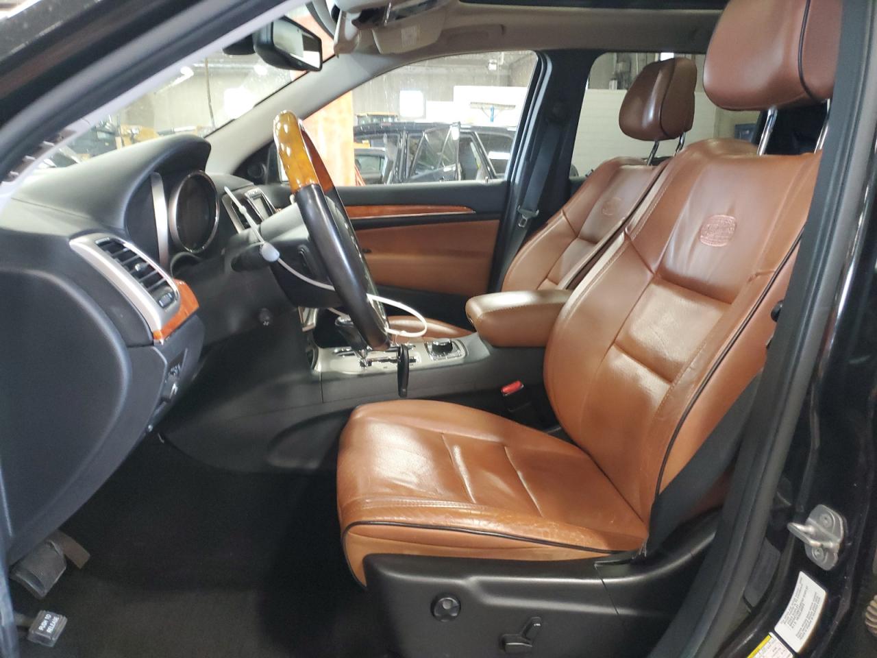 2012 Jeep Grand Cherokee Overland VIN: 1C4RJFCG5CC214050 Lot: 66410885