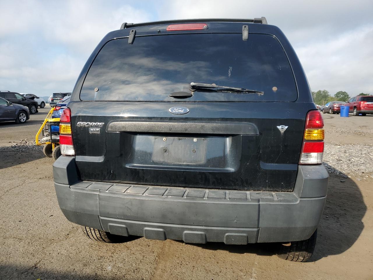 2005 Ford Escape Xlt VIN: 1FMYU03105KC11802 Lot: 71604225