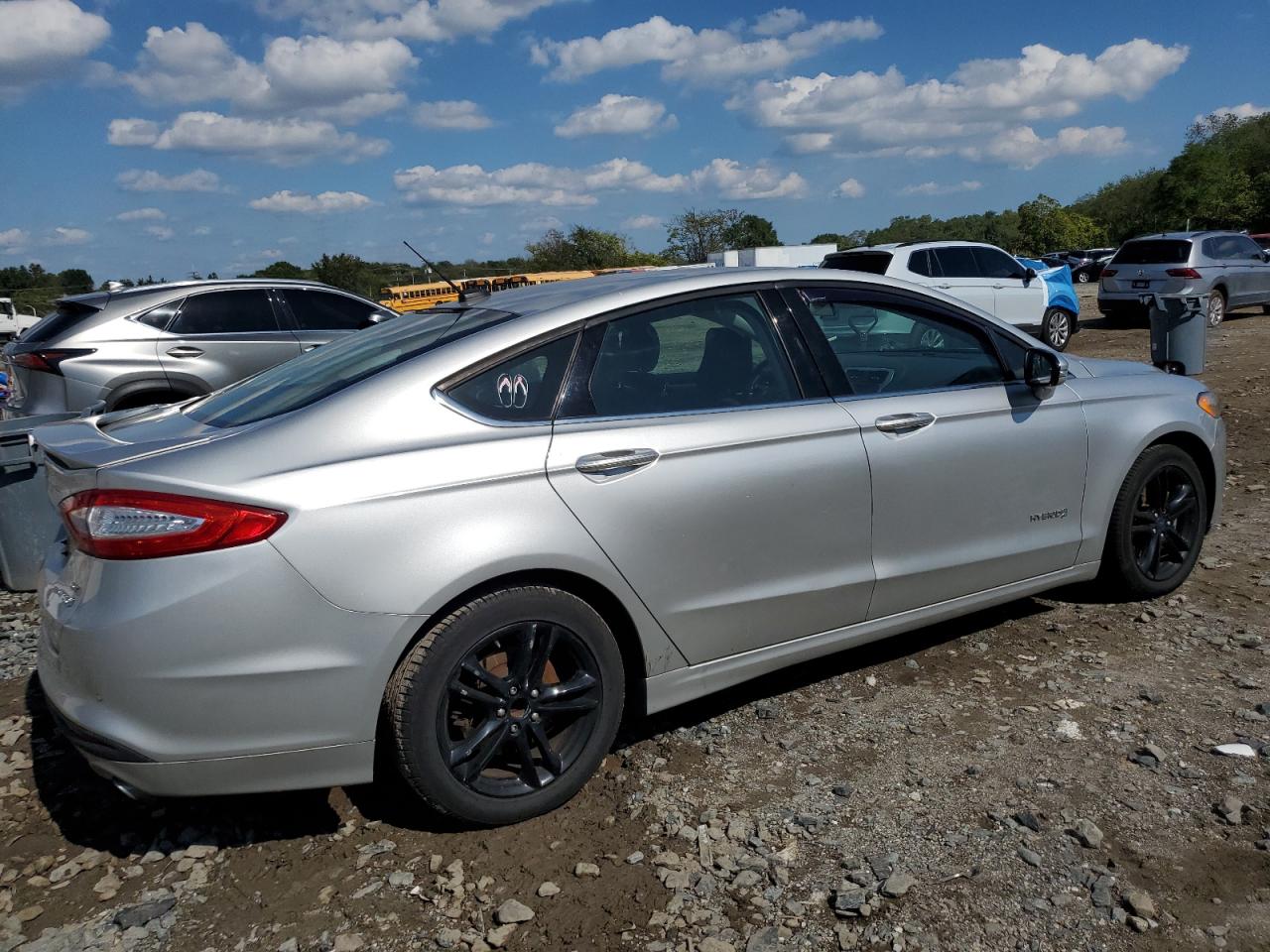 2015 Ford Fusion Se Hybrid VIN: 3FA6P0LU7FR165028 Lot: 83786435