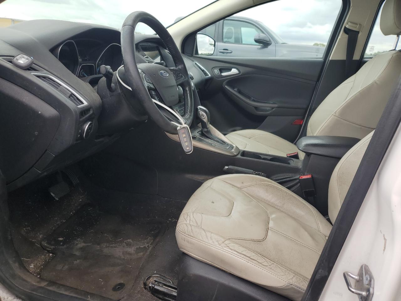 2016 Ford Focus Titanium VIN: 1FADP3N2XGL307909 Lot: 84206775