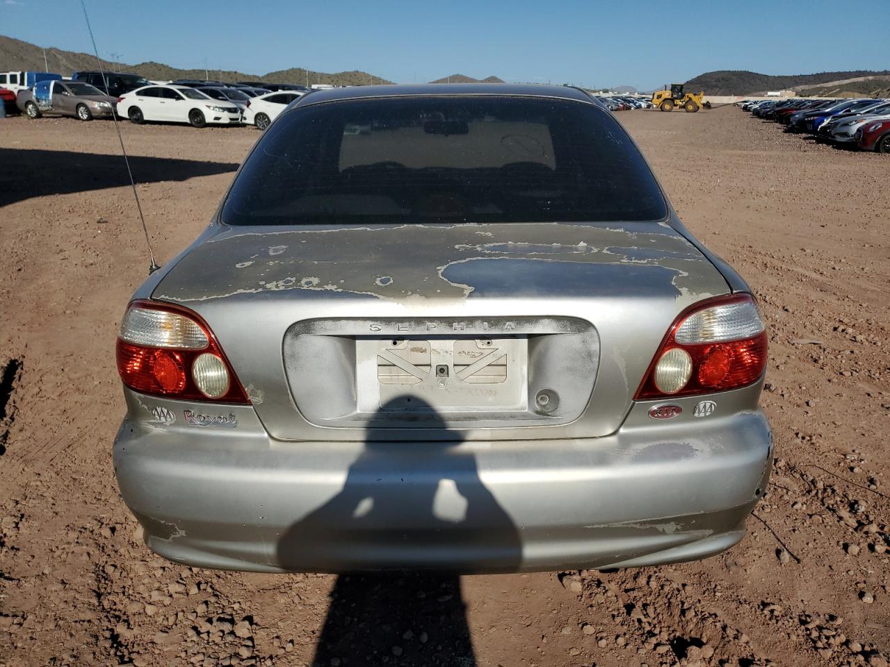 1999 Kia Sephia Base VIN: KNAFB121XX5791664 Lot: 81975375